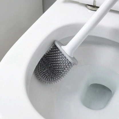 Brosse WC silicone flexible nettoyant efficacement le rebord de la cuvette des toilettes